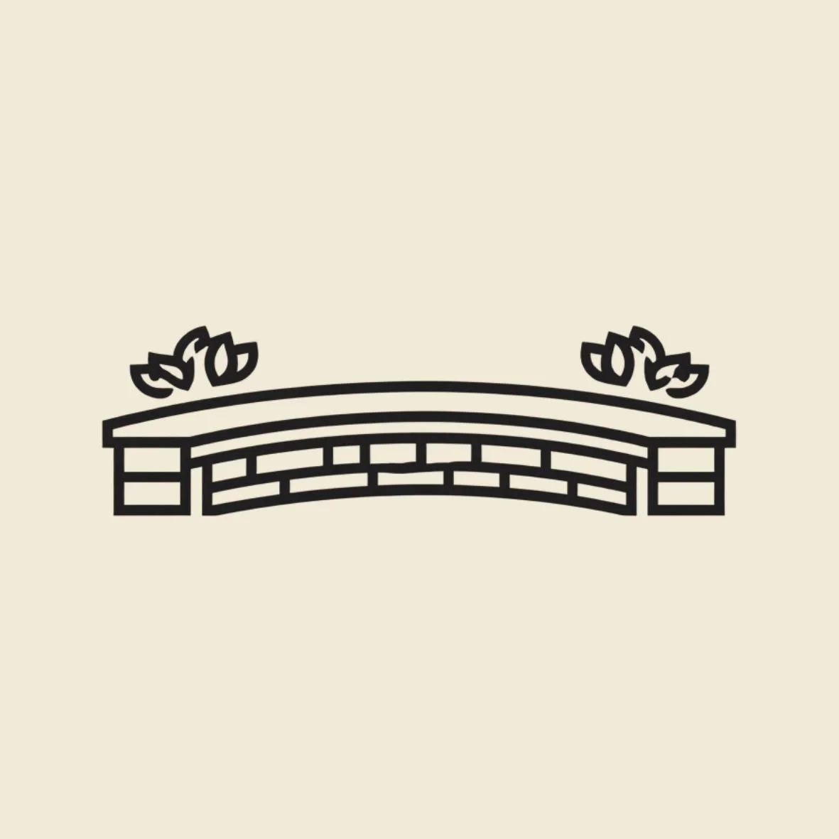 Black line icon showing a curved stone seating wall with end pillars and decorative plants behind it, representing custom backyard seating walls and patio hardscaping services
