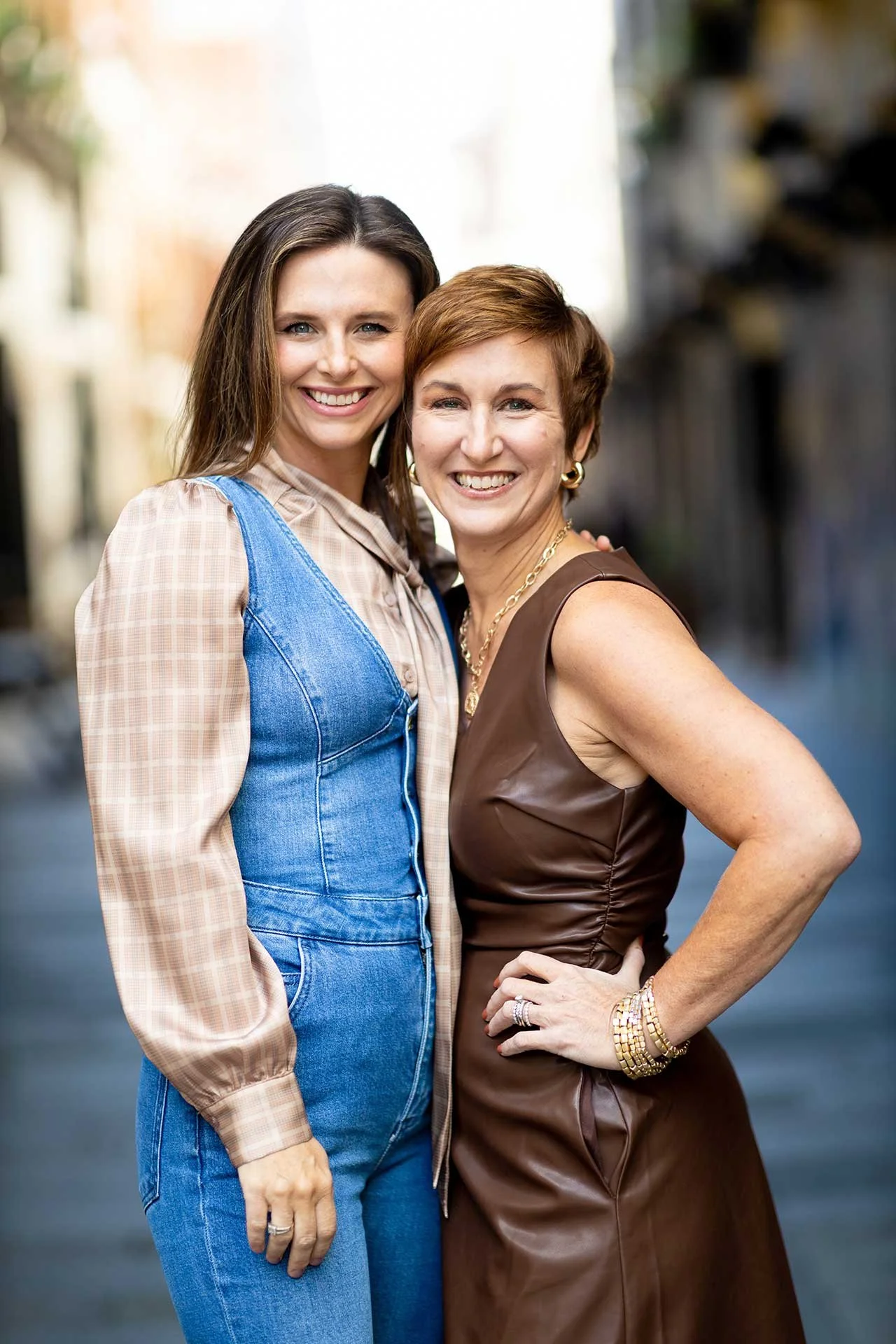 Smiling interior design and renovation experts Katie and Jen in Denver.