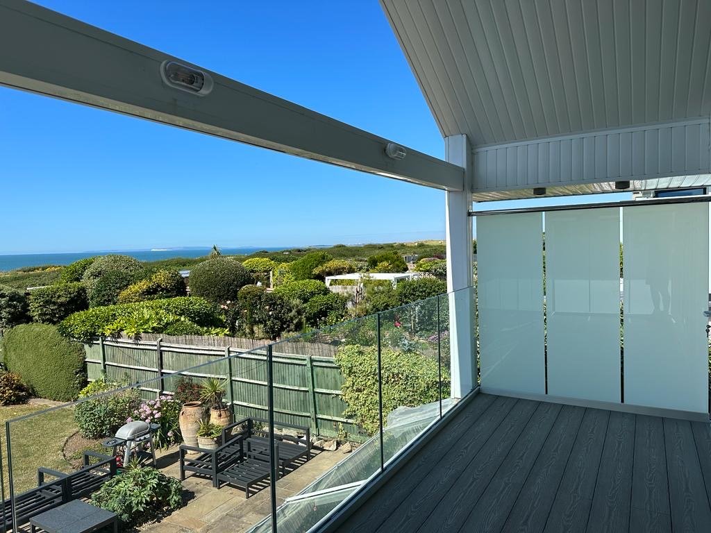 Frameless glass balustrade fitted in Milford-on-sea, Hampshire