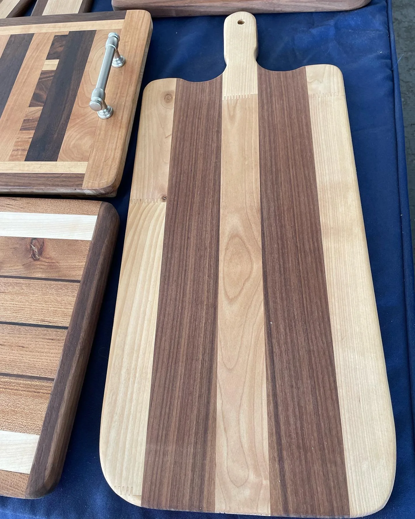 Carson City Farmers Market. Got some cool wood scraps from a cabinet shop this week, so I added a few new items. The dog bone boards are going to be part of gift baskets at an upcoming dog show.