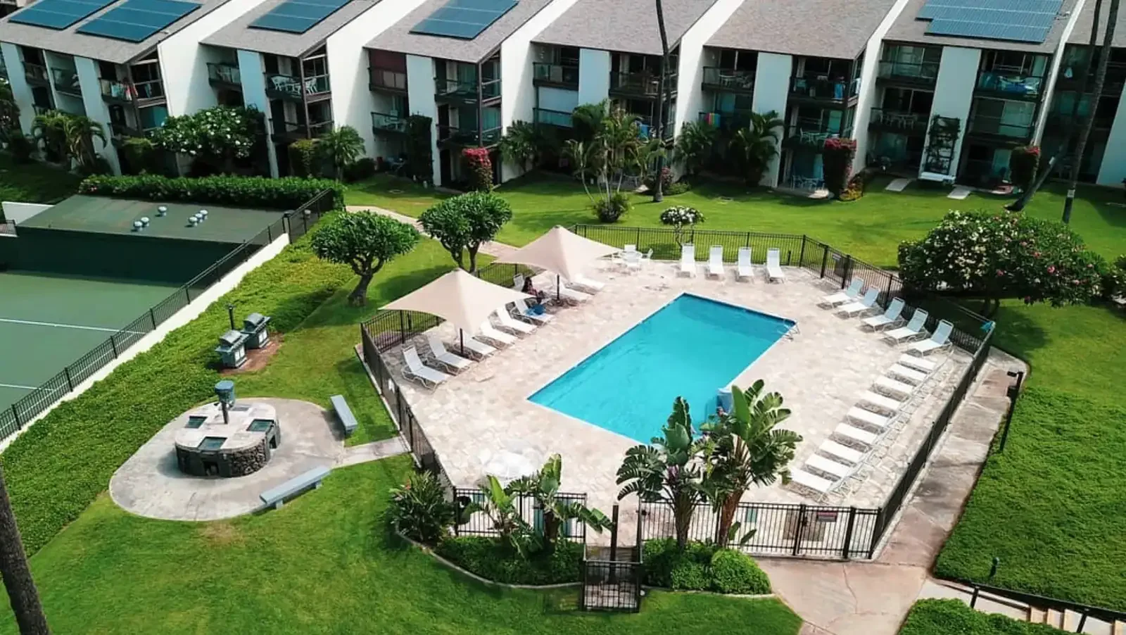 Hale Kamaole condominium pool and tropical grounds in South Kihei, Maui