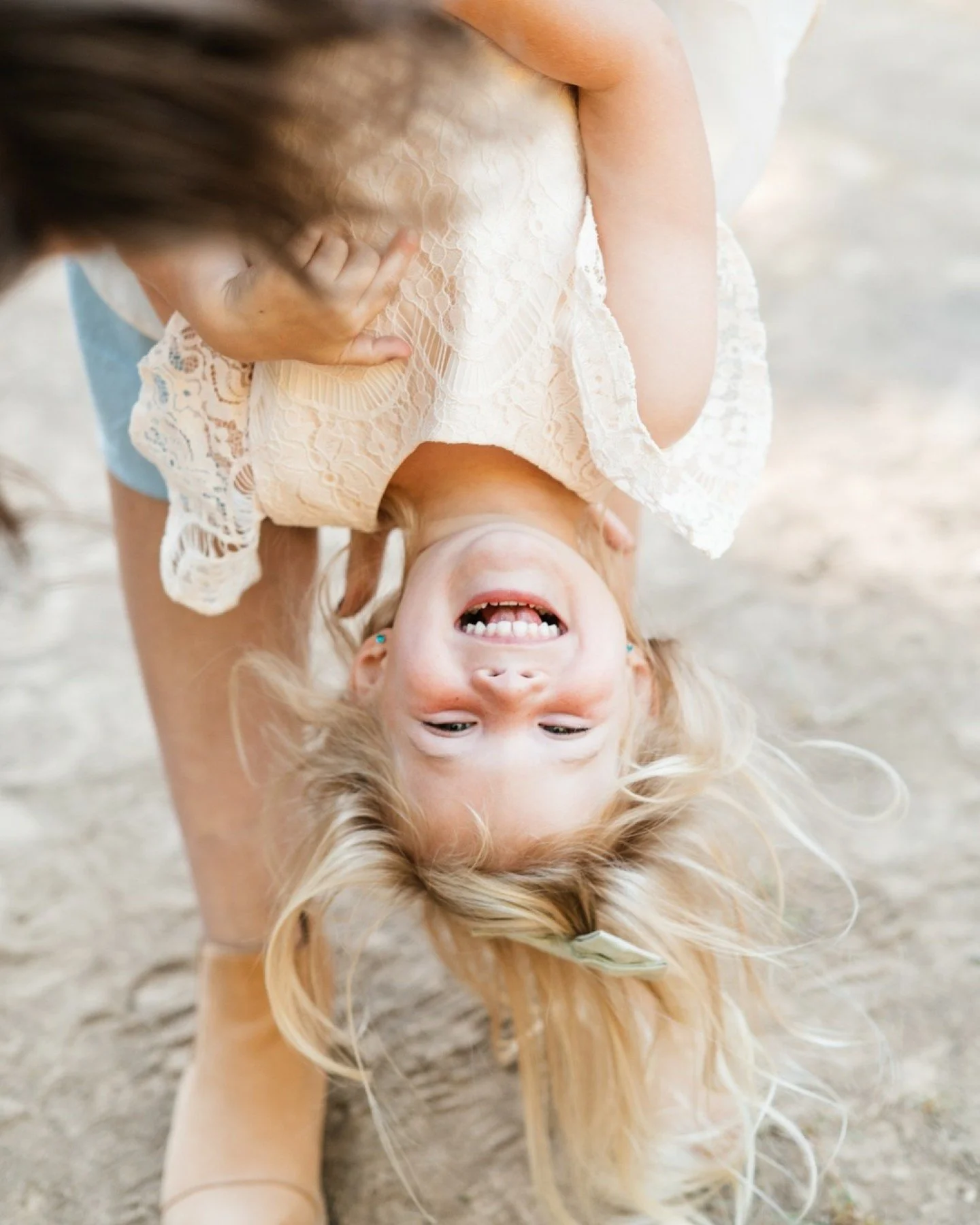 This is the part of the session nobody plans for - and the part everyone ends up loving most. 😄

I don't know what it is about getting upside down, but kids absolutely lose it in the best way. Give a kid permission to be silly in front of the camera