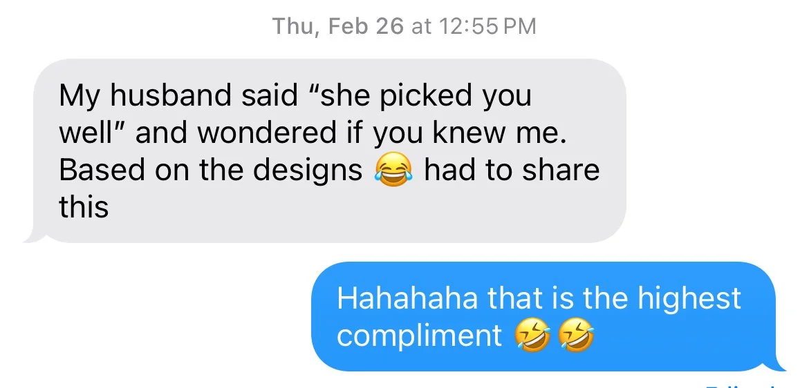 A screenshot of a text message conversation on a smartphone. The first message at 12:55 PM on February 26th says: 'My husband said she picked you well and wondered if you knew me. Based on the designs 😂 had to share this.' The reply reads: 'Hahahaha that is the highest compliment 🤣🤣'.