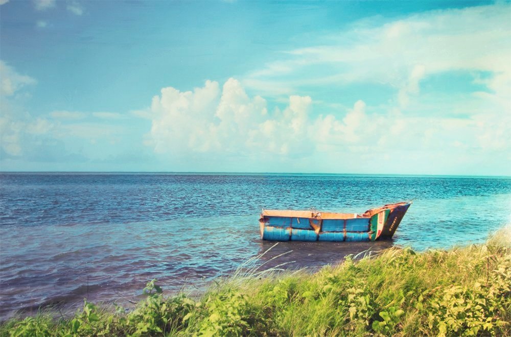 Refugee Boat in Paradise