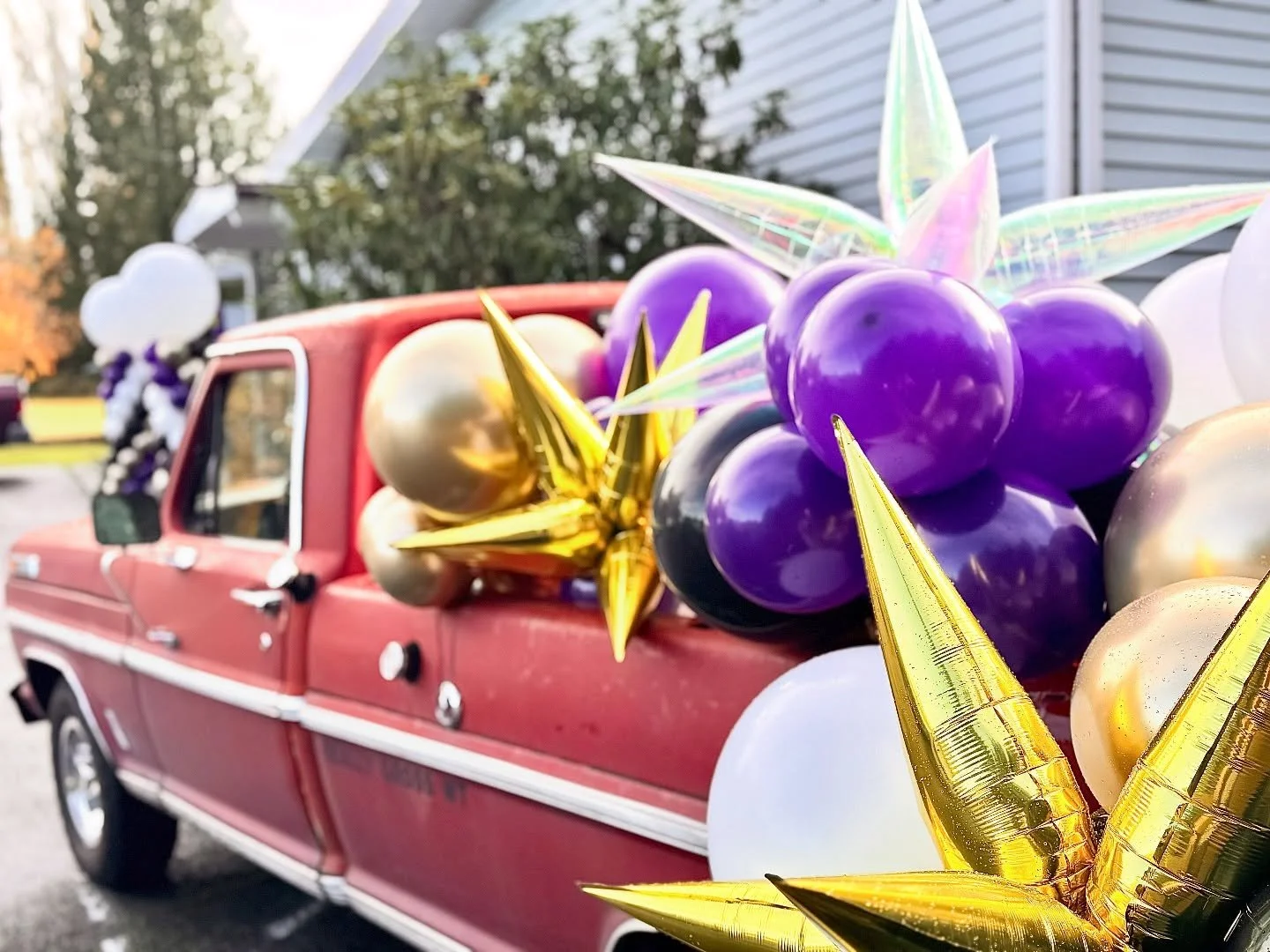 This 90TH birthday bash was one for the books! I had so much fun filling this truck bed with balloons for a UW themed party!!

While it turned into a beautiful fall day yesterday, the wind  was intense. Hiring a company ensures that every arrangement