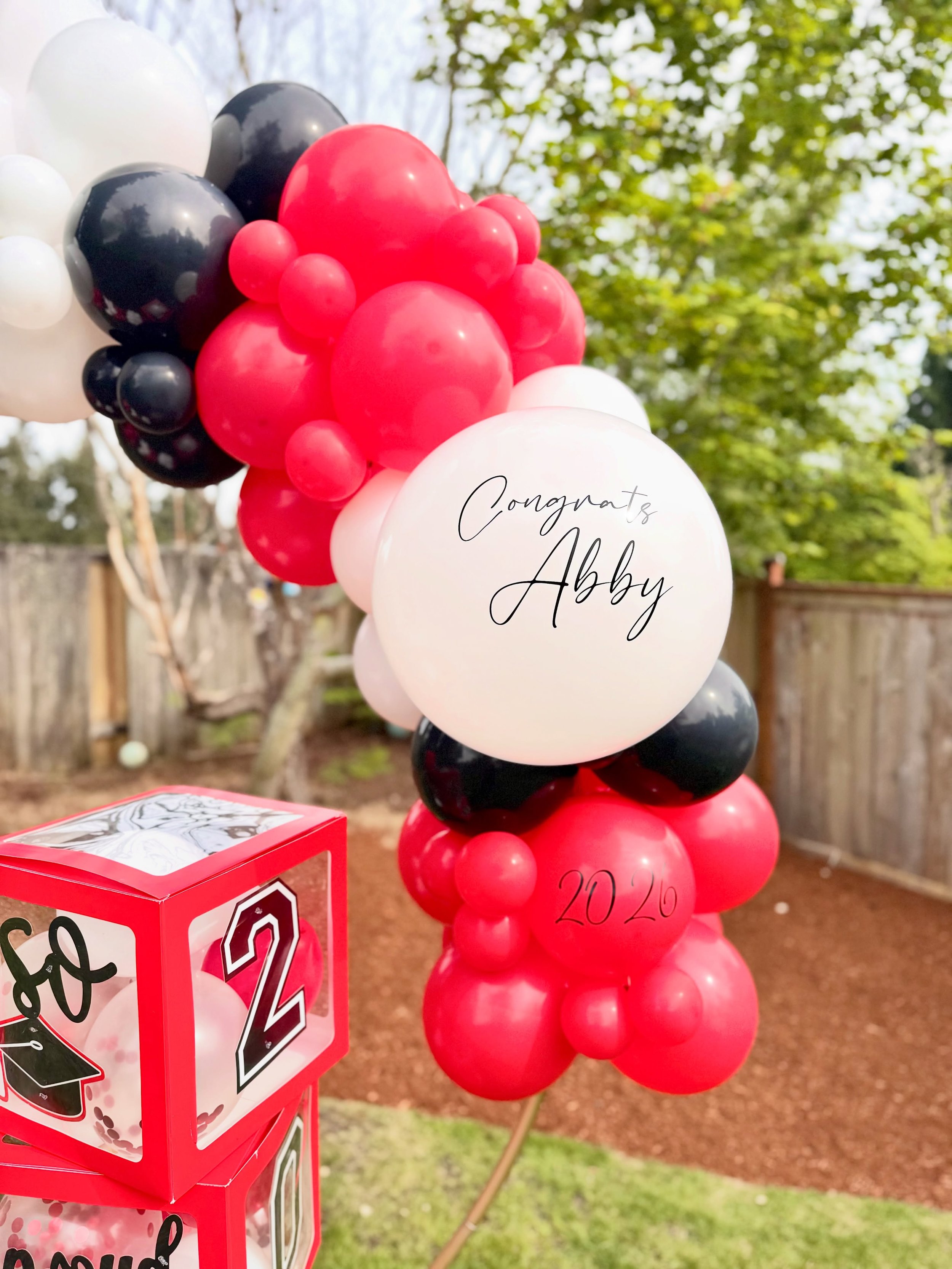 Grad season has officially begun! First up - Half hoop in red, black and white to honor a grad from @saintmartinsuniversity!! 

Weekends in June are almost full, if you have a grad to celebrate please reach out ASAP! Also offering pickup options Mond