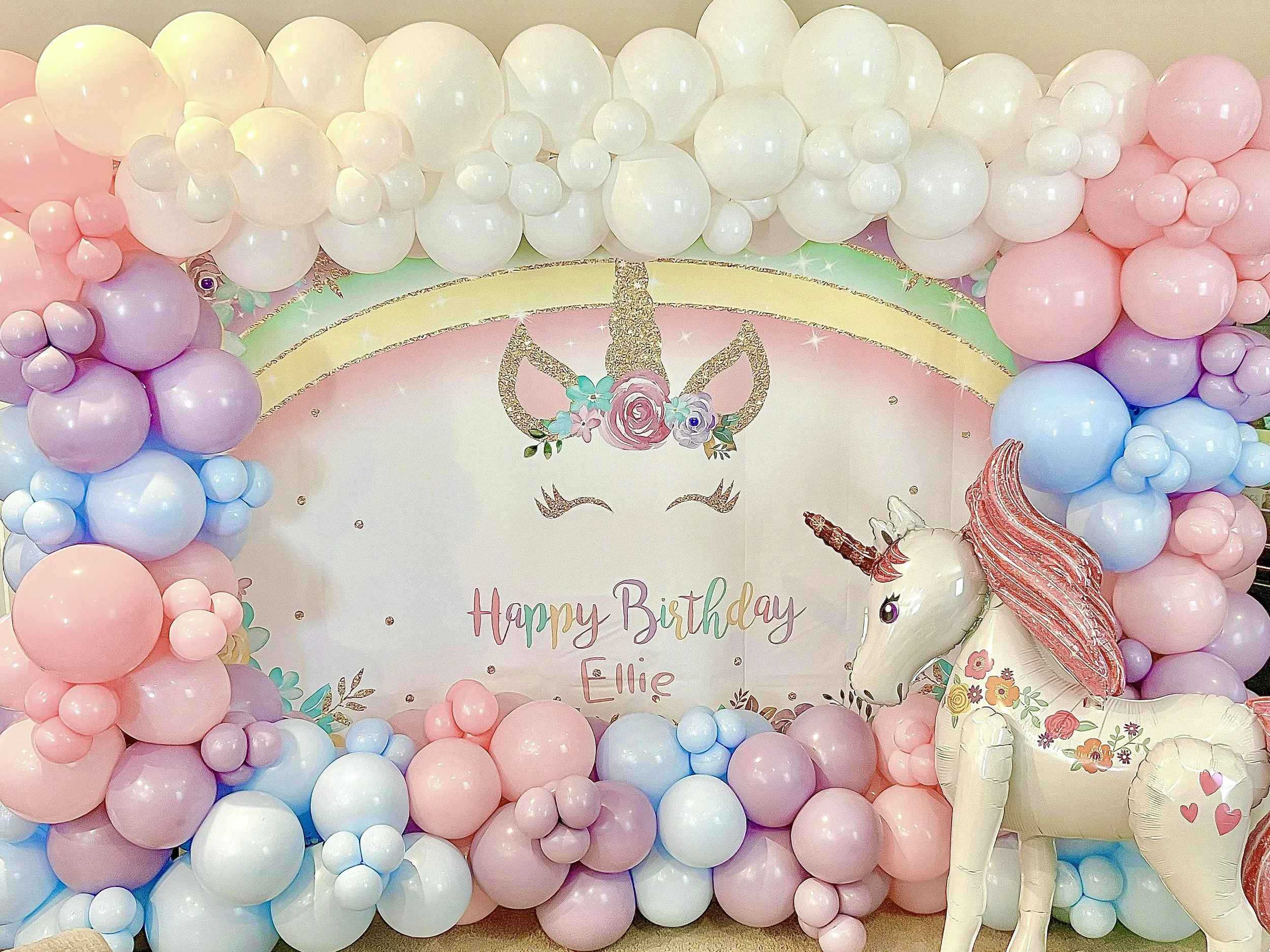 Colorful unicorn birthday party balloon design in Puyallup
