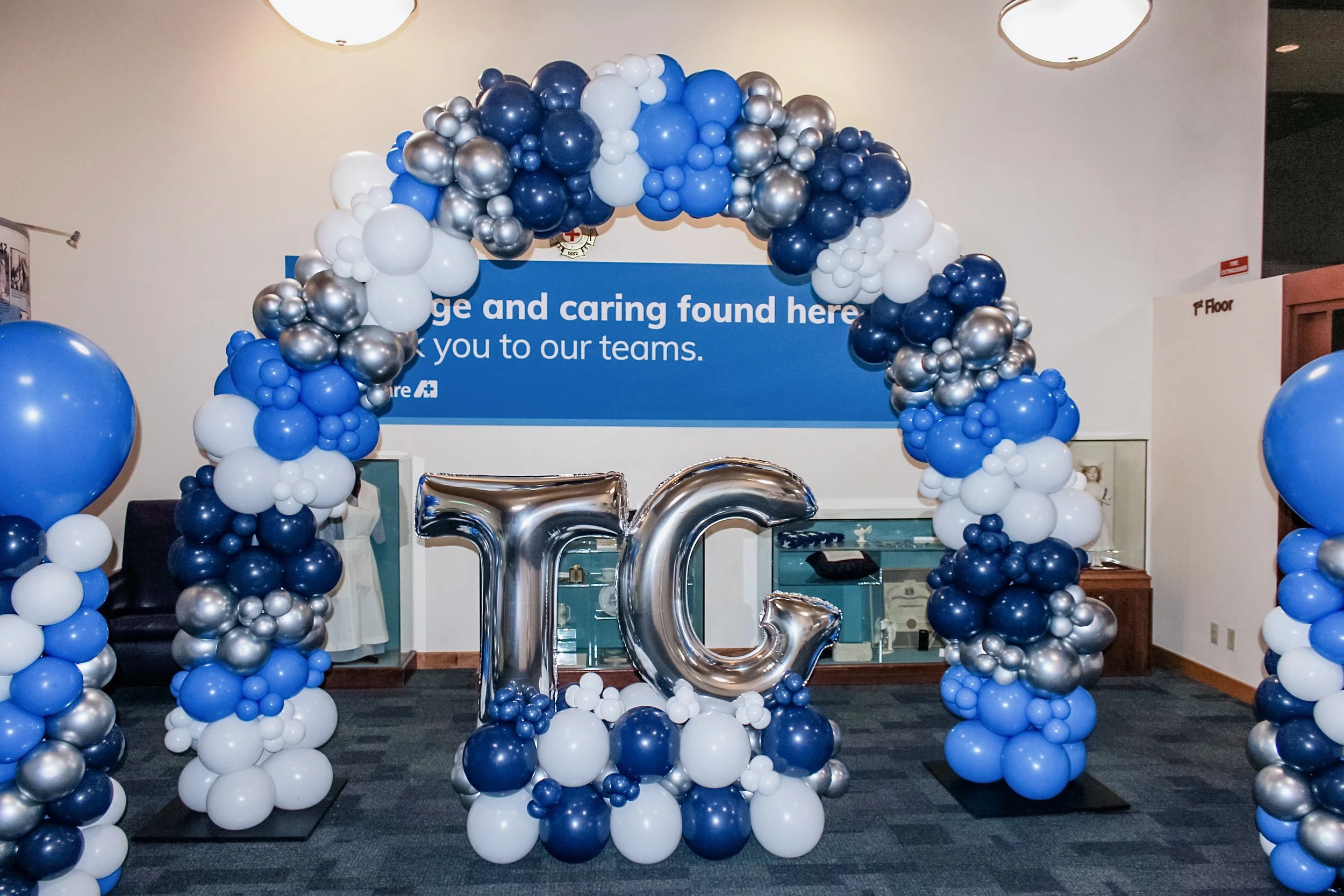 corporate-event-balloon-arch-grand-opening-tacoma-blue-white-silver.JPEG