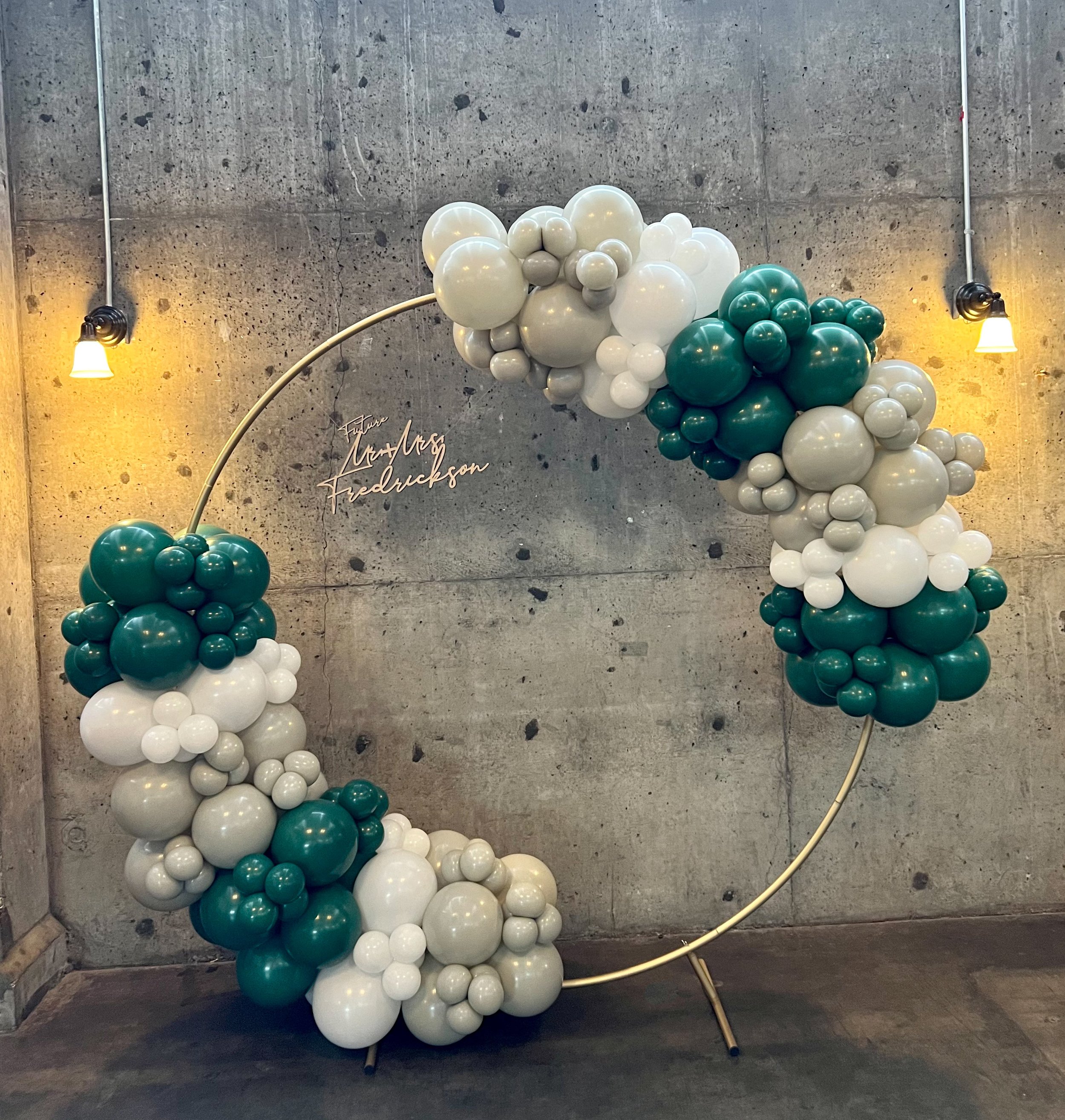 balloon-garland-decor-hoop-backdrop-industrial-venue-tacoma-green-grey-white.jpeg