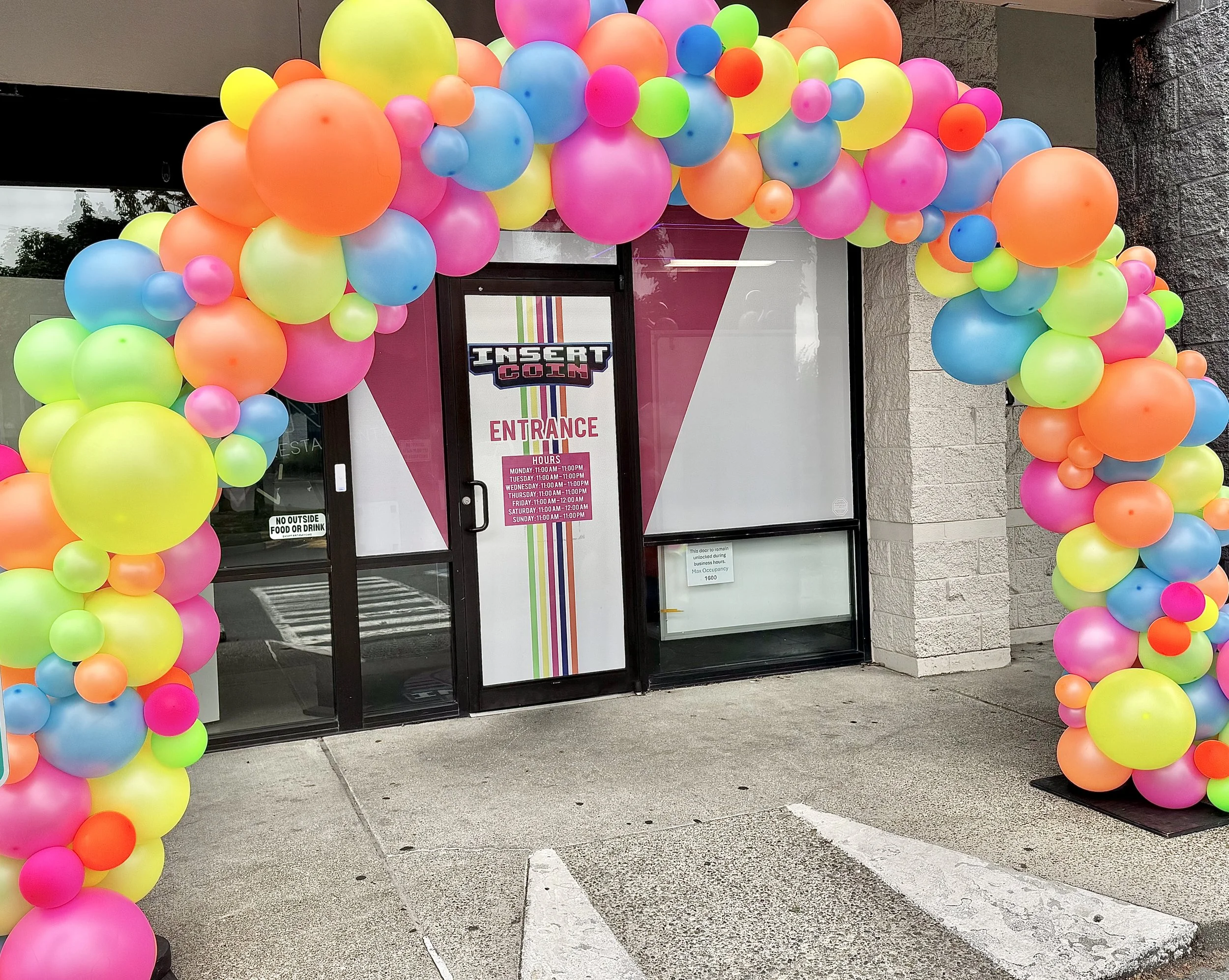 bright-balloon-arch-grand-opening-entrance-puyallup.jpeg