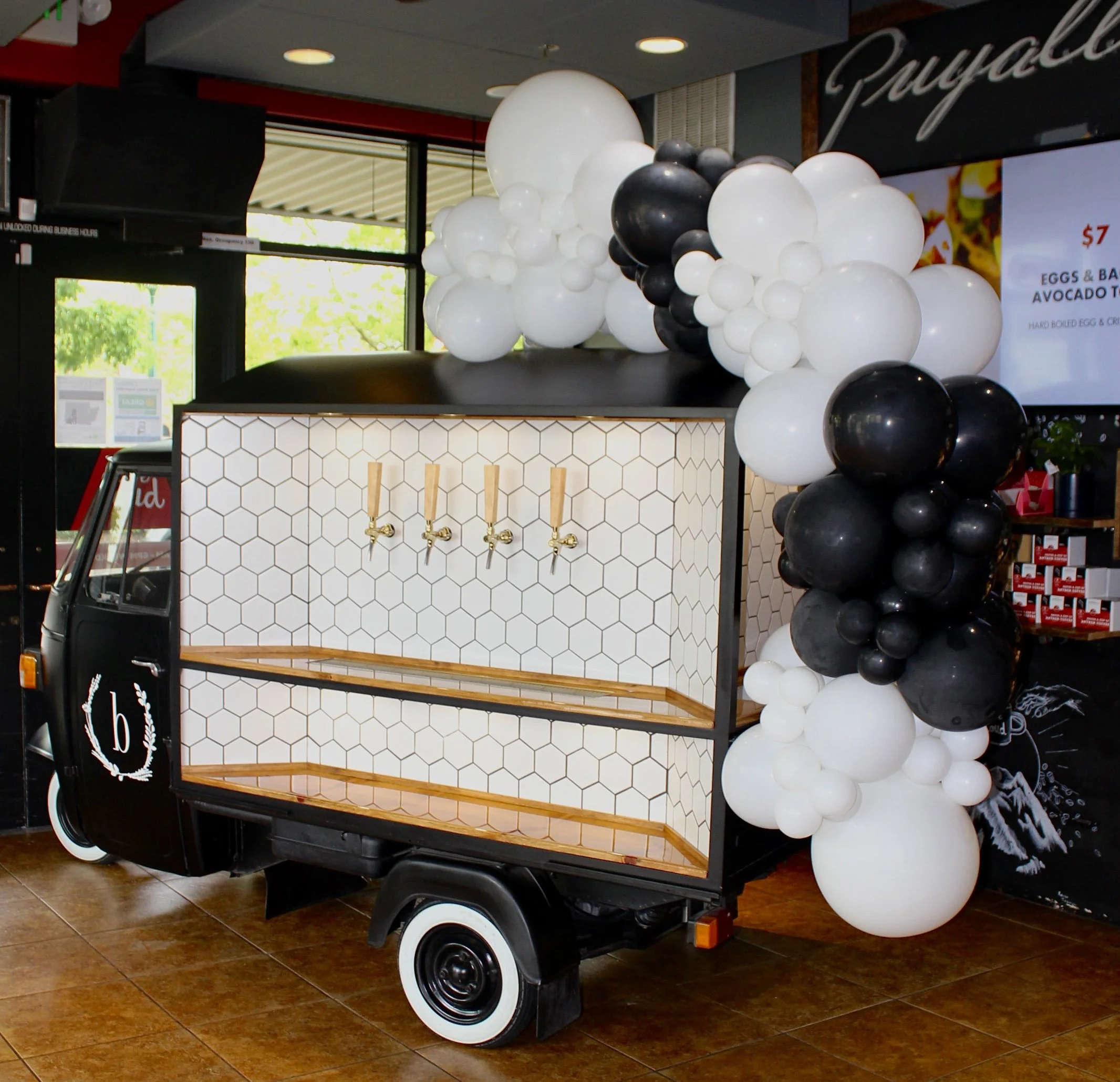 coffee-grand-opening-event-cart-with-balloon-decor-black-white-puyallup-anthem.JPEG