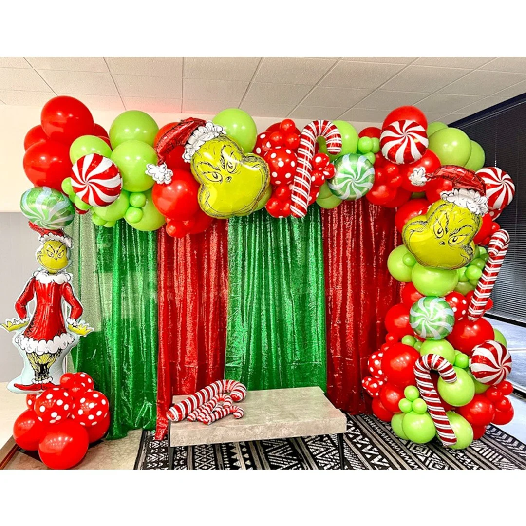 christmas-balloon-decorations-grinch-backdrop-red-green.jpeg