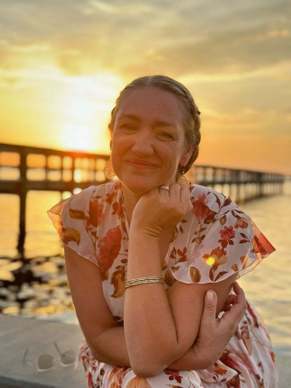 Kristin smiling at sunset