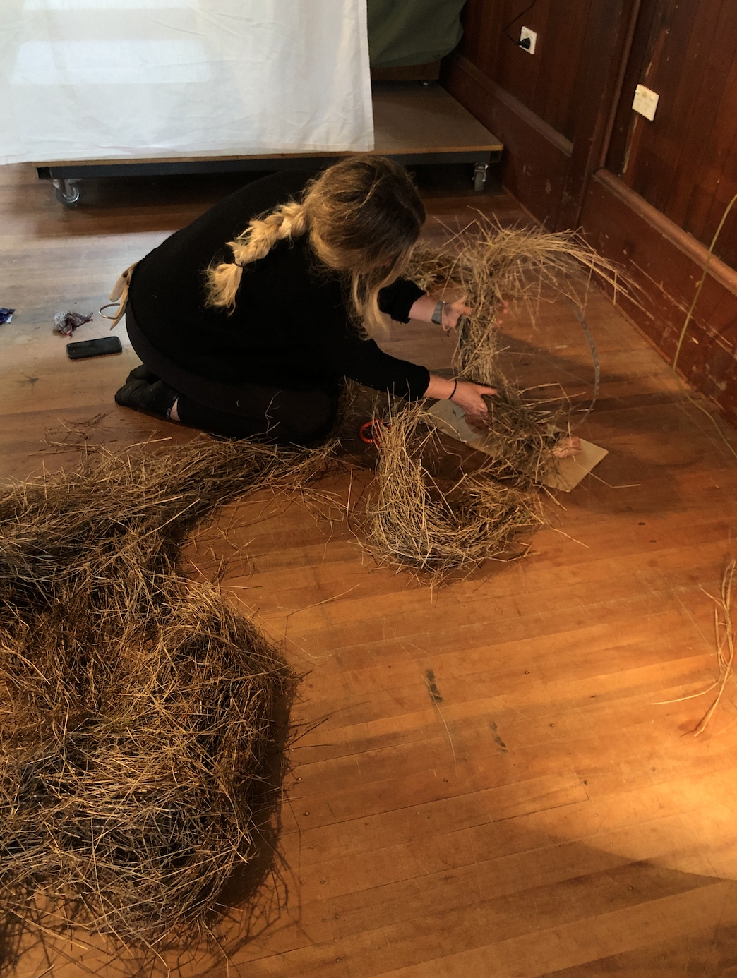 Shelley Banders creating a Bower out of foraged natural material