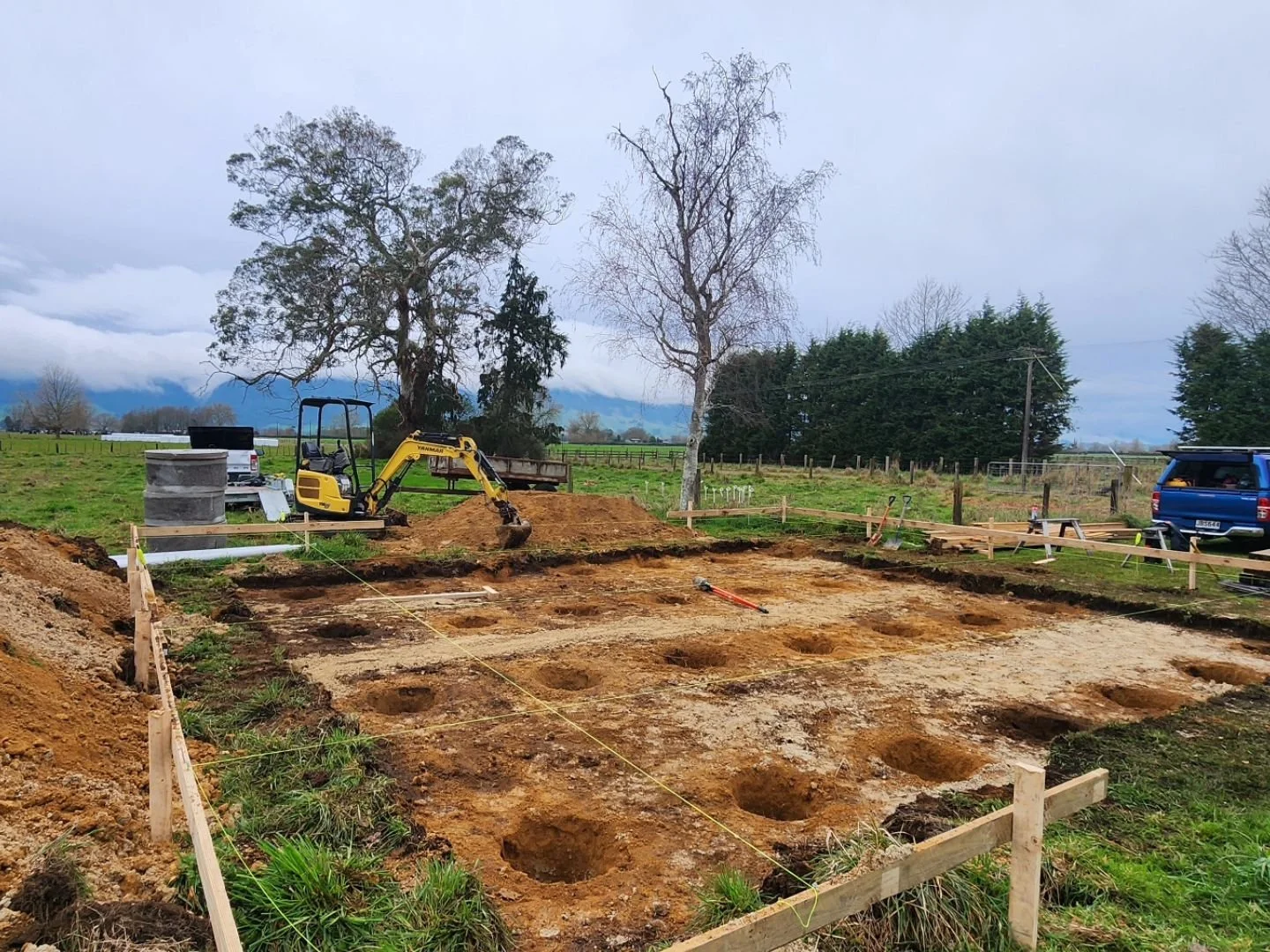 Nice to be out in the country! Site cut, Pile holes and drainage sorted for this new cottage. 🚜