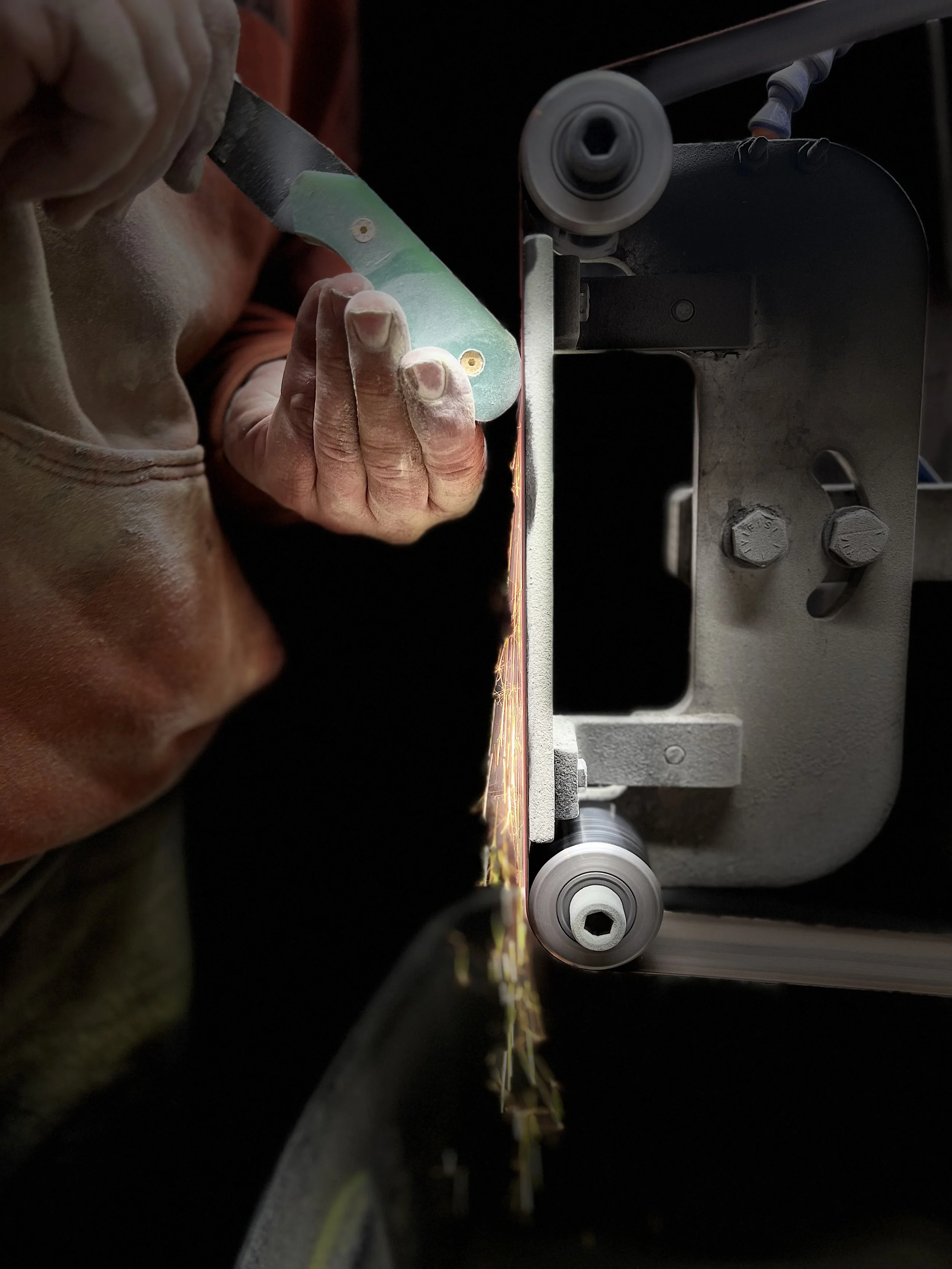 Grinding a knife, knife making, knives,