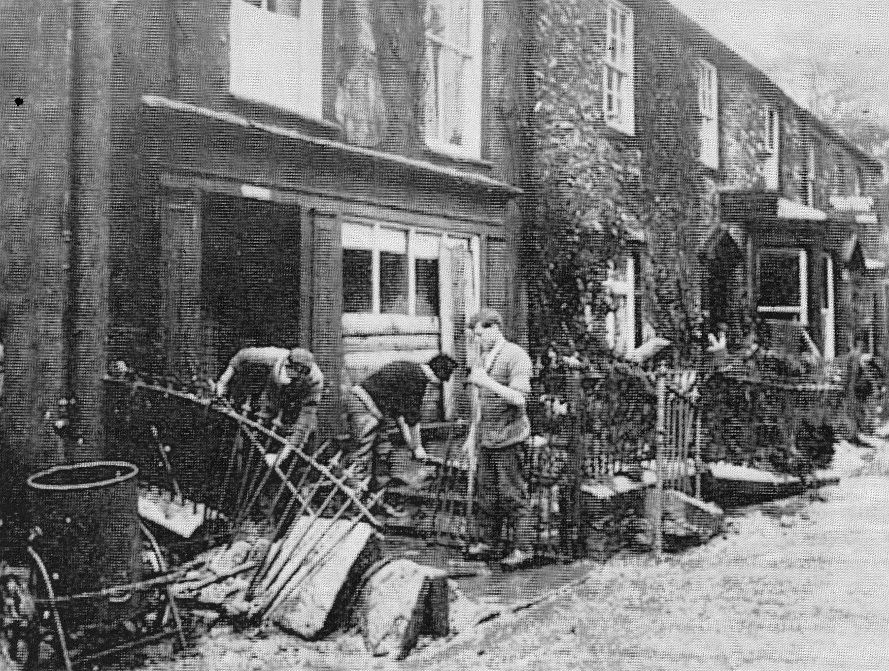 Figure 5. Cleaning up outside the Refreshment Rooms in 1927. From the Patterdale Past website.