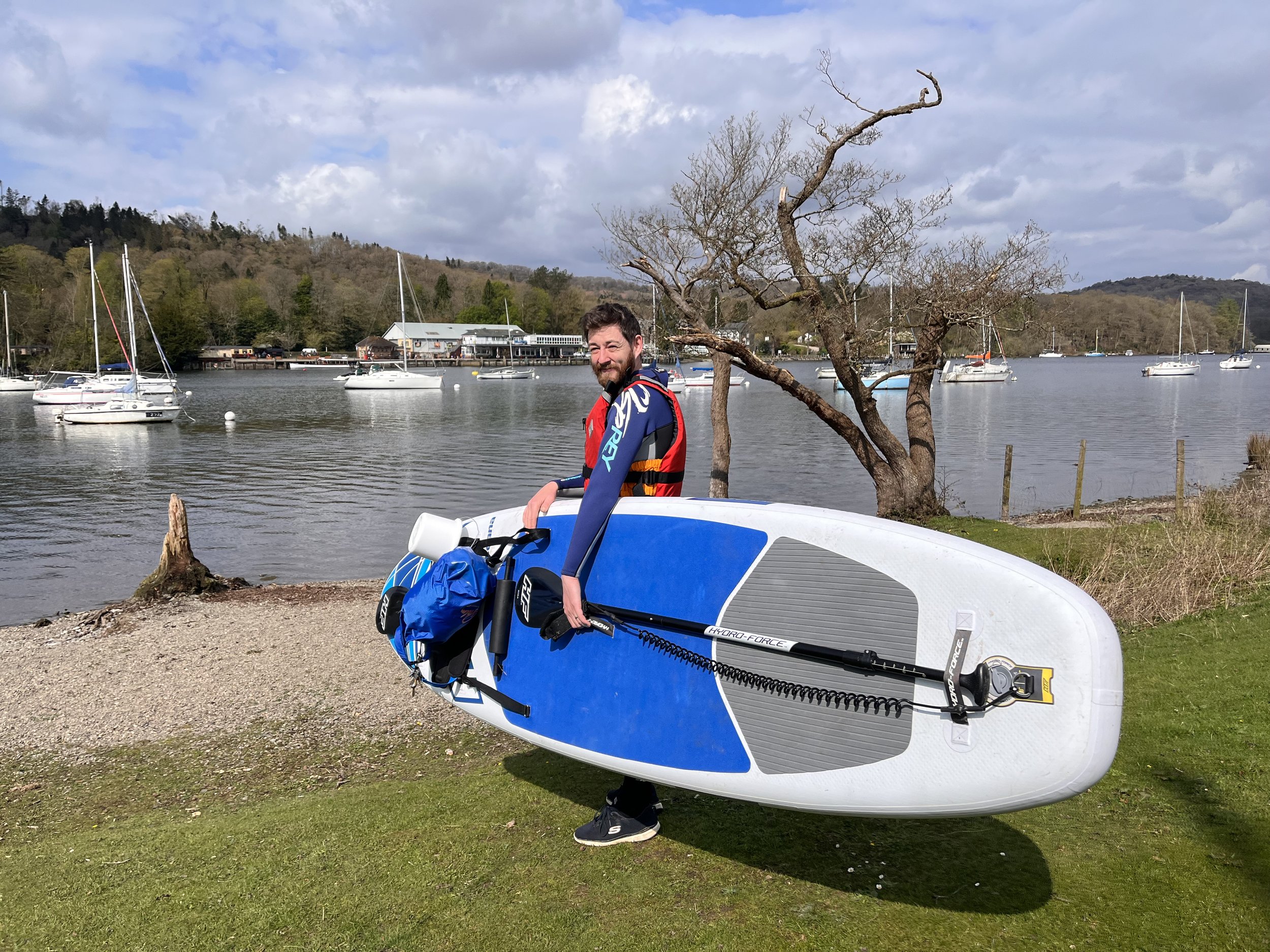 Citizen scientist Paddy about to take lake samples while on his paddle board.jpg