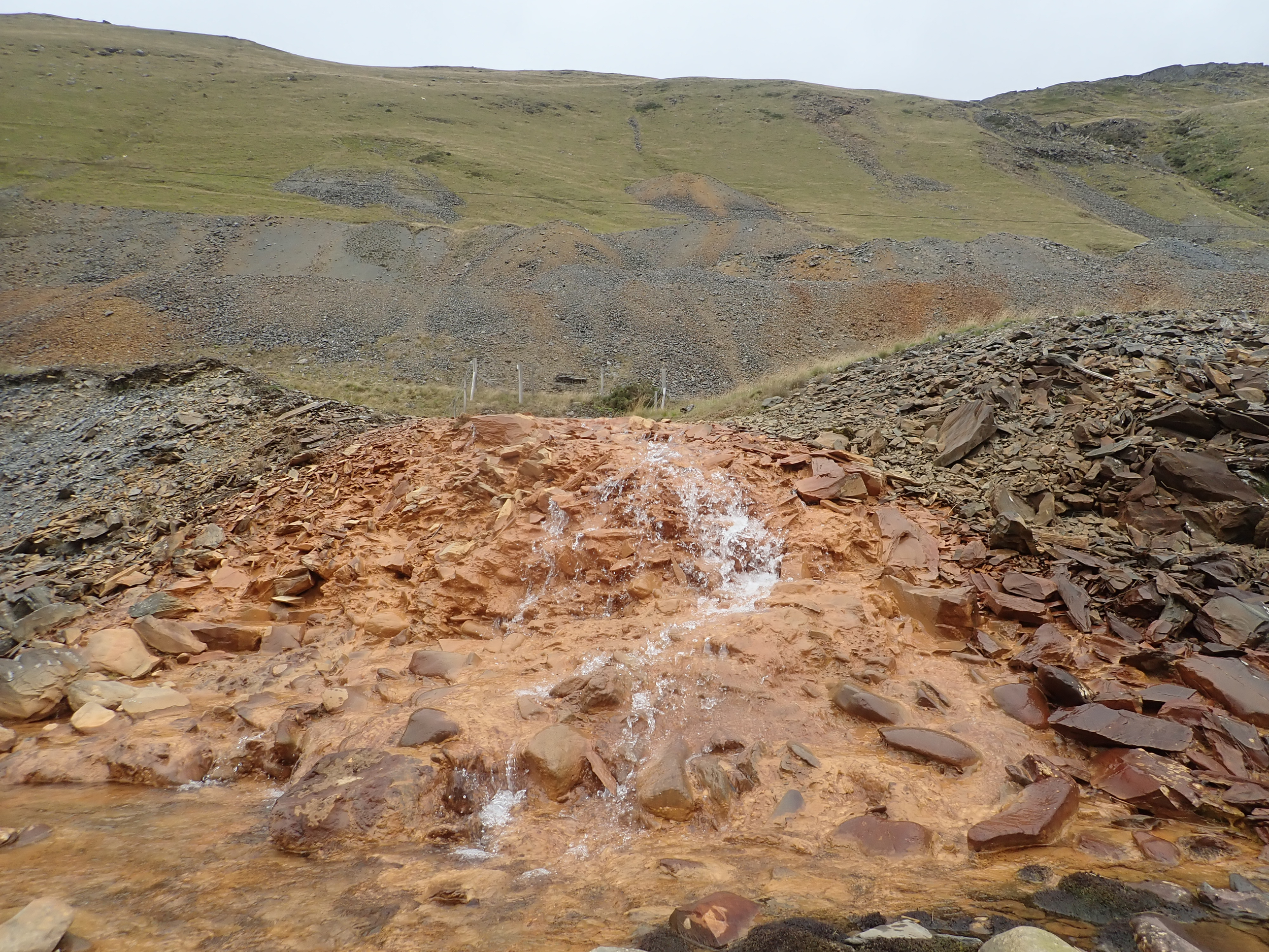 3. A point source of minewater pollution from an adit at Cwmystwyth mine into the River Ystwyth.