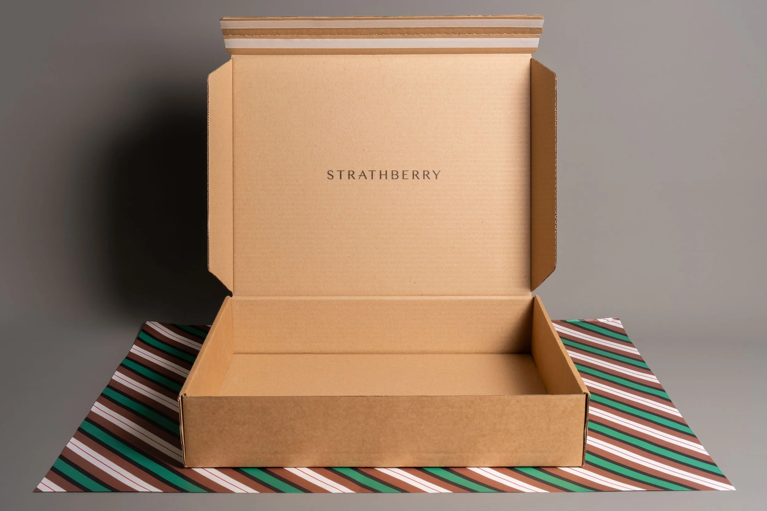 Strathberry | Apparel Packaging | Odillo