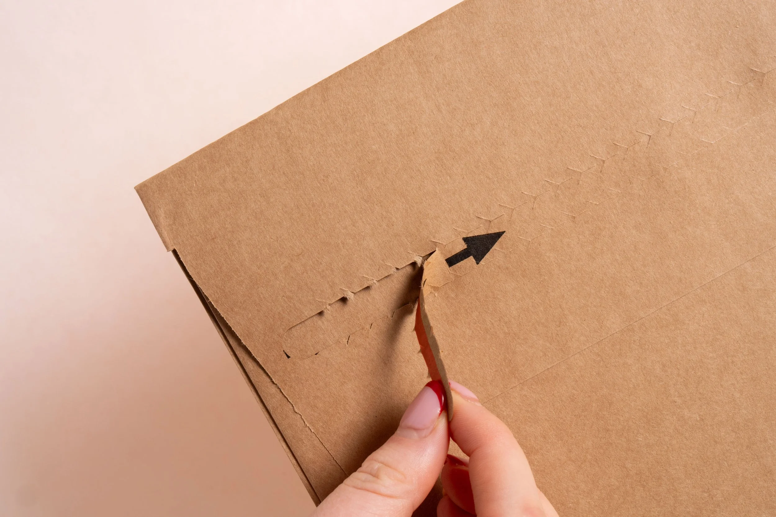 Kraft mailer ripper strip