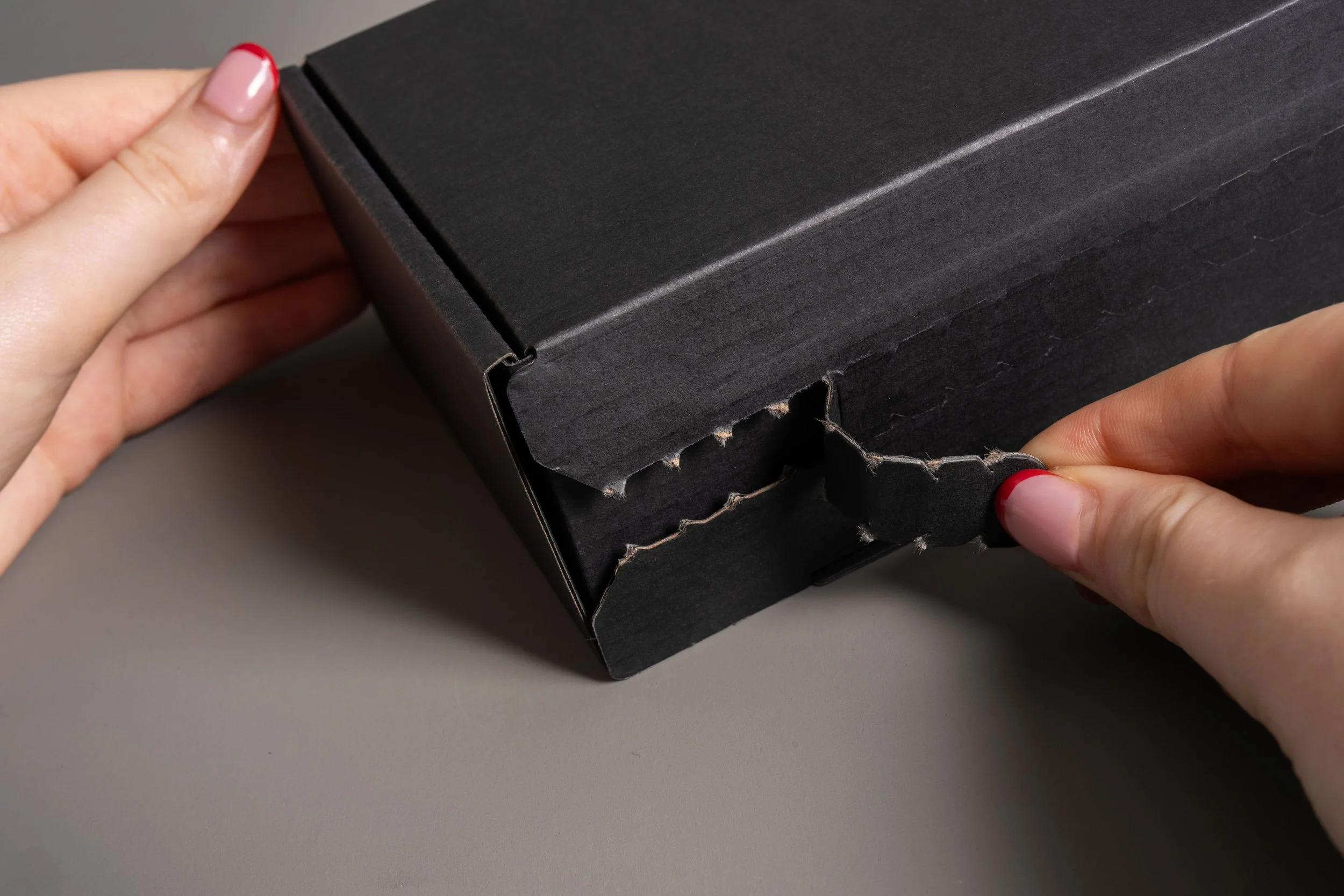 Corrugated packaging ripper strip