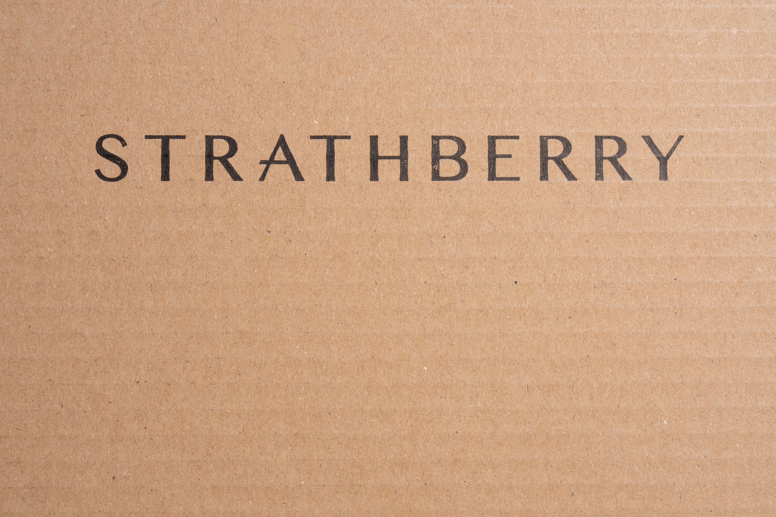Strathberry | Apparel Packaging | Odillo