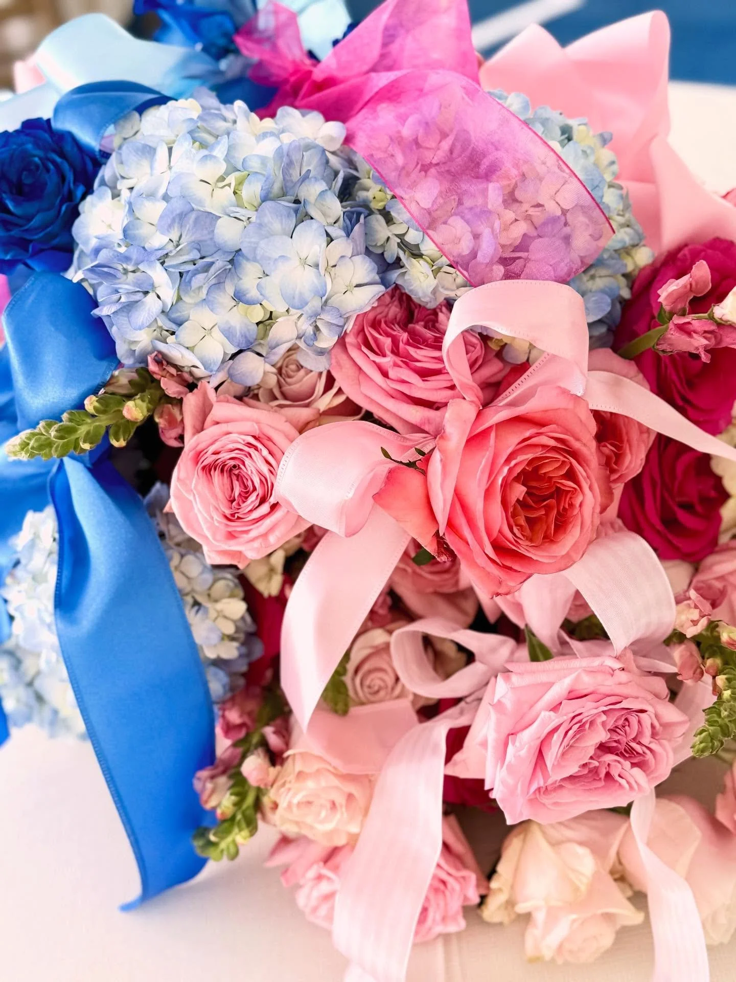 When petals hold the sweetest secret!  A beautiful idea to consider for your gender reveal 💙💕