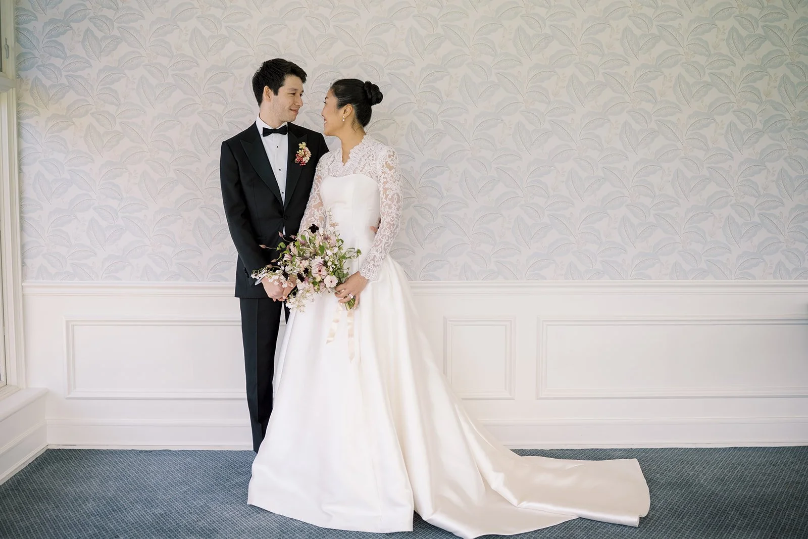 formal wedding portrait of bride and groom at black tie wedding