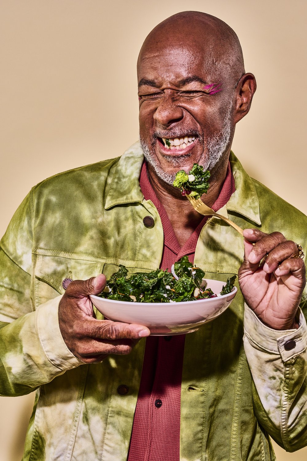 Portrait of Troy eating kale salad
