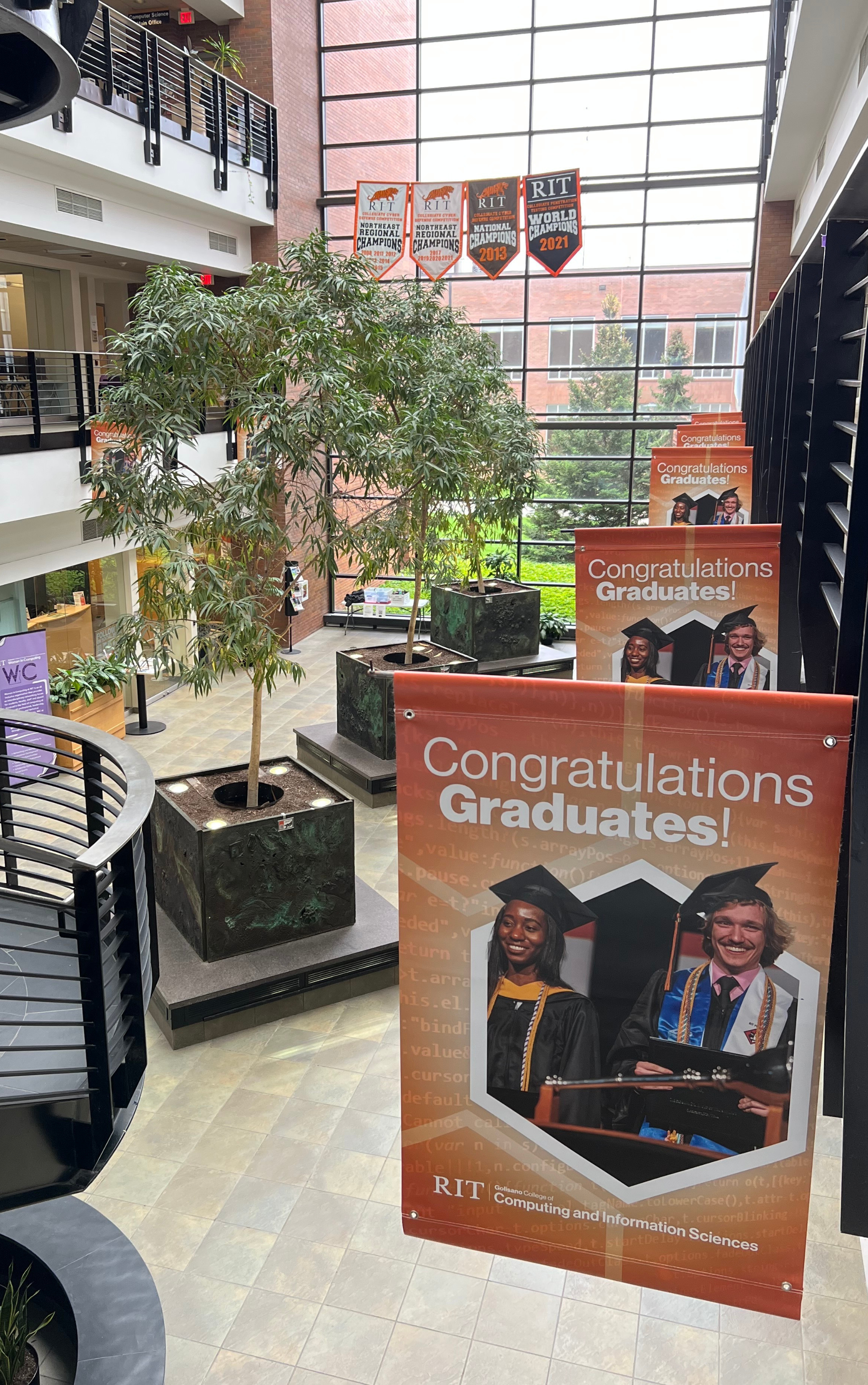 Commencement Banners hanging in RIT Golisano Hall