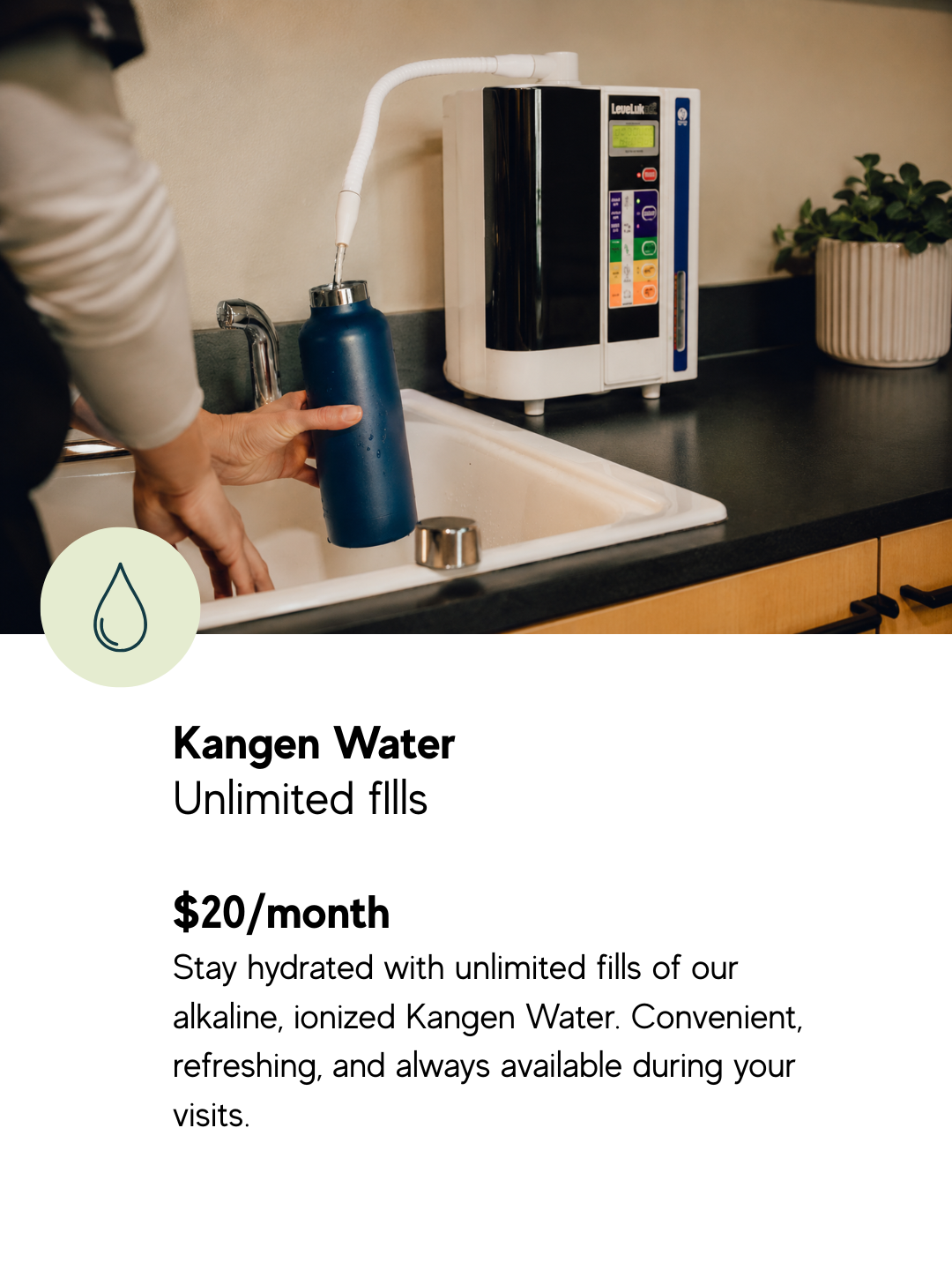 A person filling a reusable blue water bottle with Kangen alkaline ionized water from a countertop water system at In Light Hyperbarics.