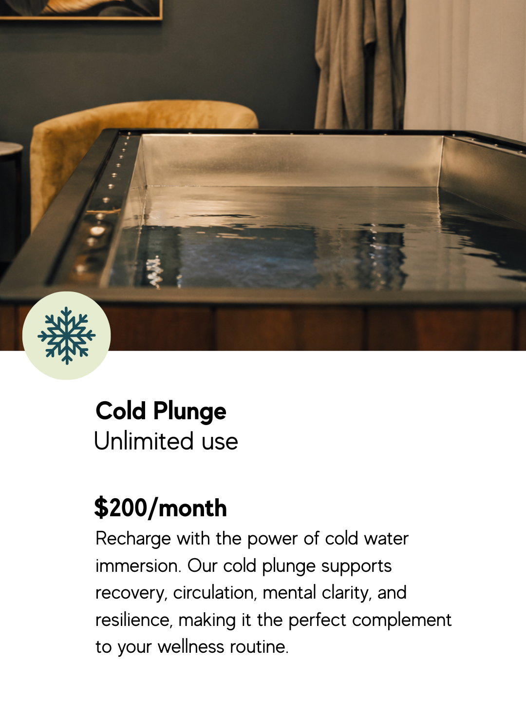 A stainless steel cold plunge filled with fresh water in a private wellness room for cold water immersion therapy.