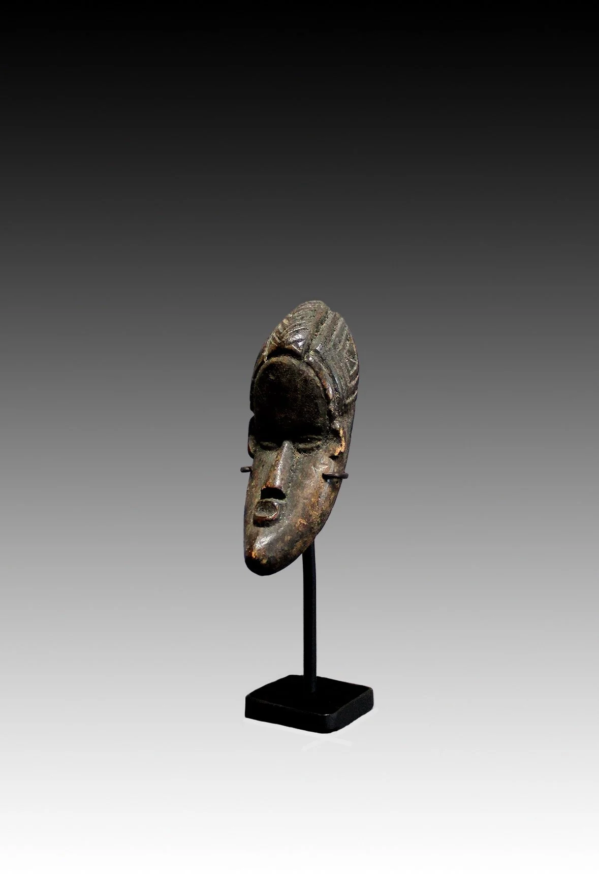 Miniature African masks.  www.gallerytribalart.xom