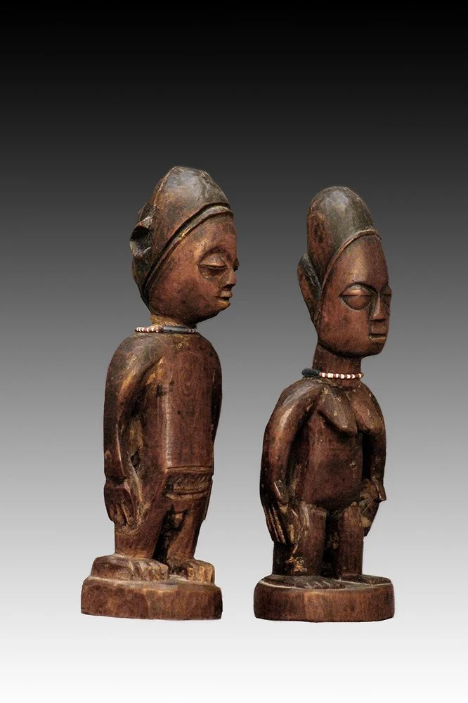 Yoruba Ibeji male and female pair.  www.gallerytribalart.com