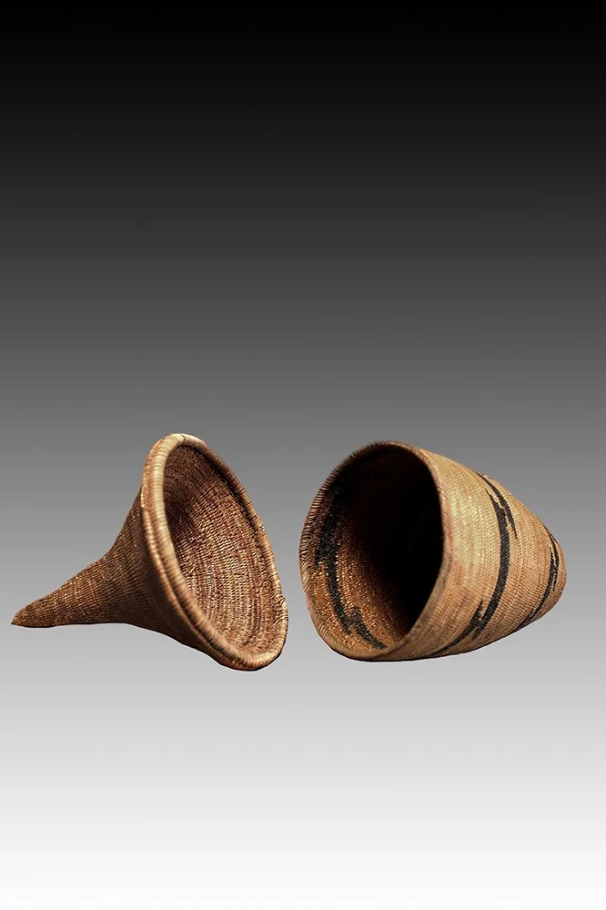 Tutsi basket with dyed patterns of spirals, triangles and zig zag designs.  www.gallerytribalart.com