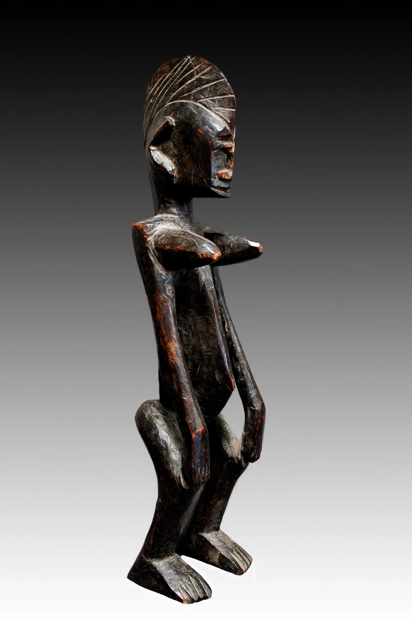 Bamana female wood carved figure, Mali.  www.gallerytribalart.com