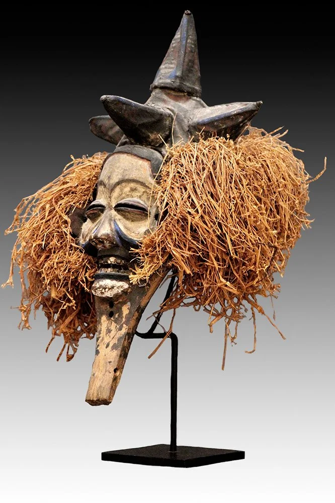 Yaka dance mask with conical headdress.  www.gallerytribalart.com