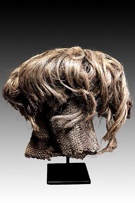 Lwena mask has sisal hair & knitted costume.  www.gallerytribalart.com