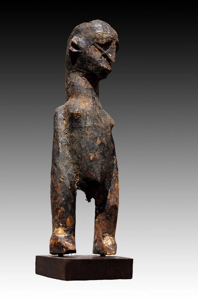 Lobi figures were placed on altars in family shrines and were used for protection against illness and misfortune.  www.gallerytribalart.com