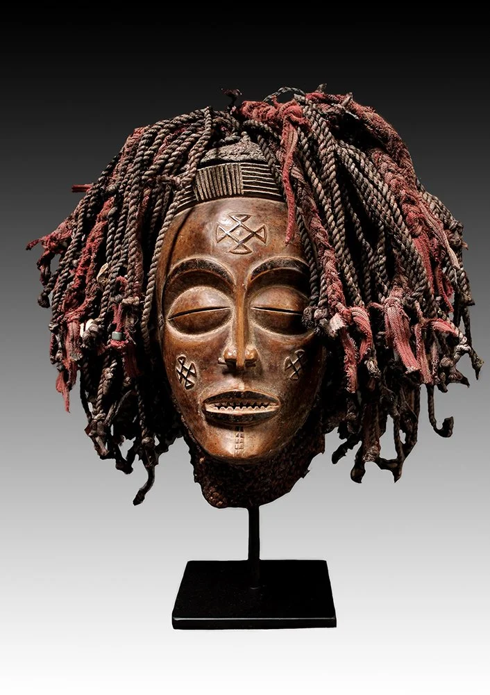Chokwe mask represents a young woman.  www.gallerytribalart.com