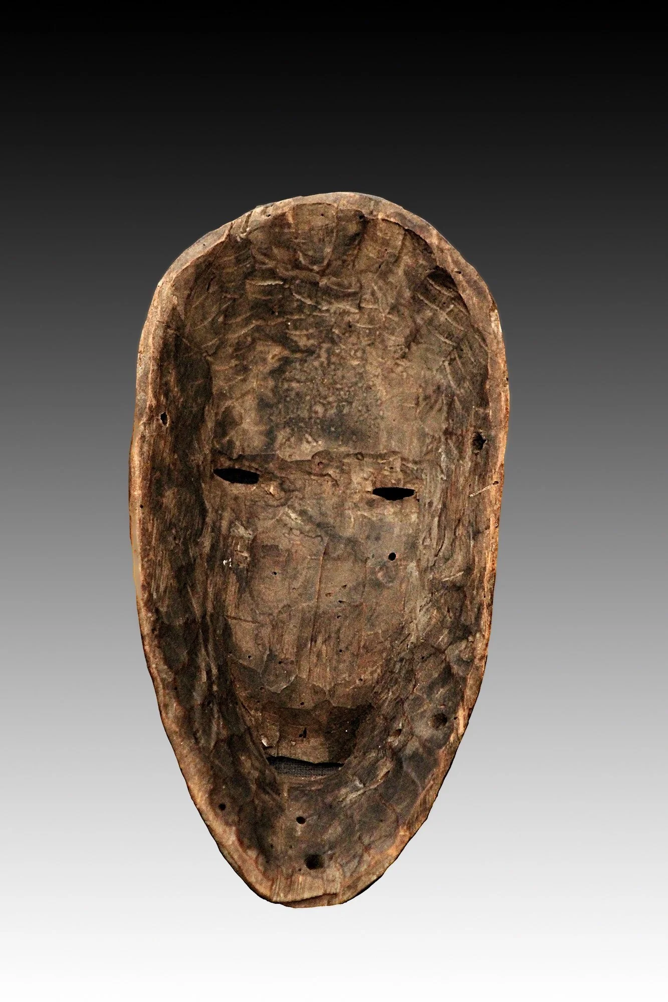 Lega mask, back view showing dry wood with age.  www.gallerytribalart.com