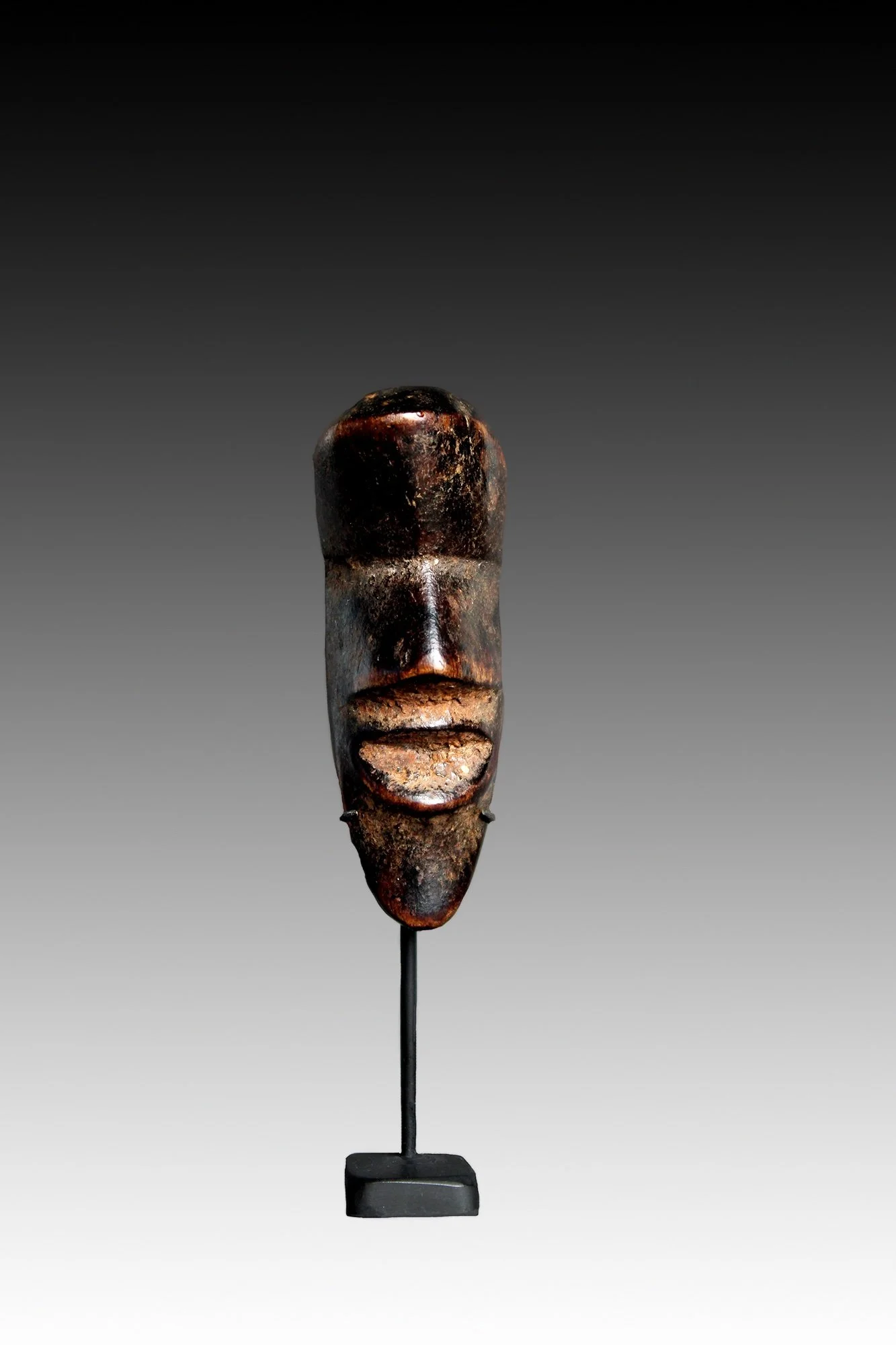 Miniature African passport masks.  www.gallerytribalart.com