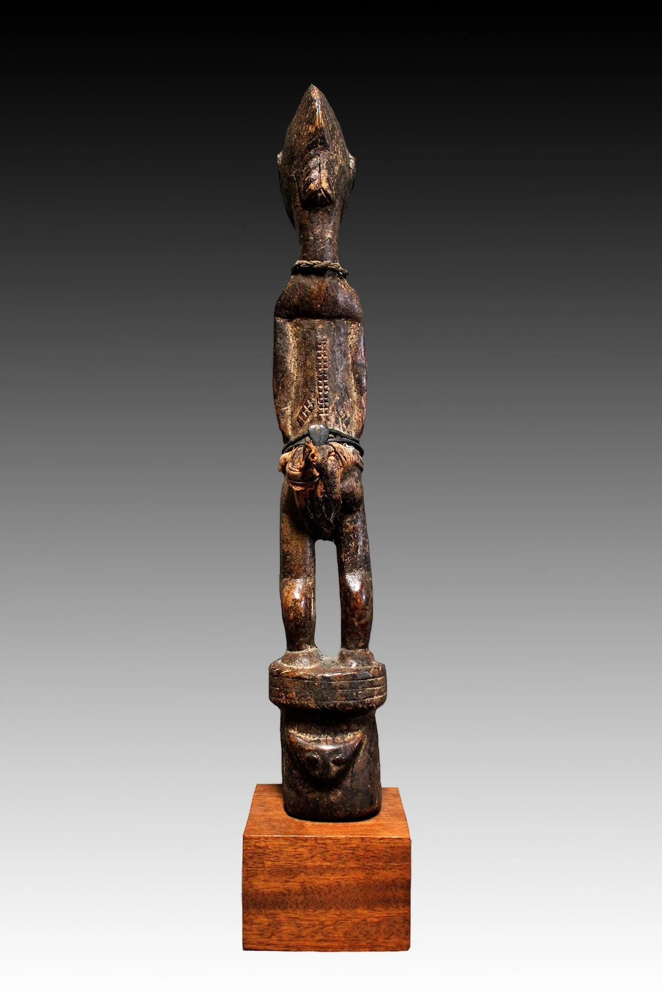 Baule statue back side view shows scarification.  www.gallerytribalart.com