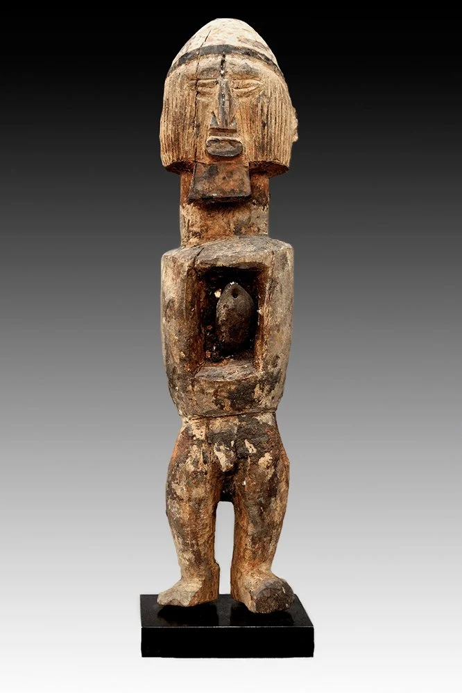 Teke figure with mass of organic materials in abdominal cavity.  www.gallerytribalart.com