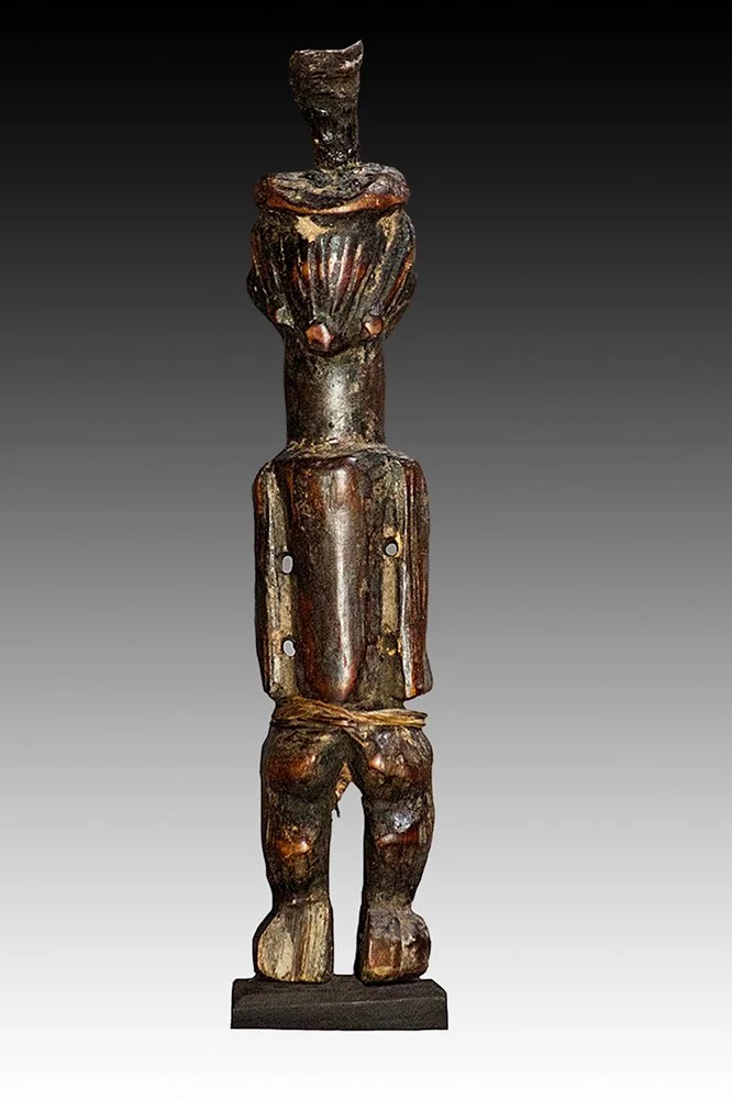Songye figure with four holes for attachments.  www.gallerytribalart.com