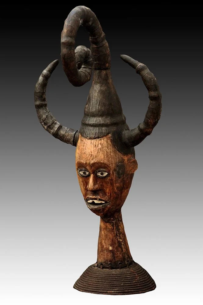 Ekoi mask with white eyes, filed teeth and scarification.  www.gallerytribalart.com