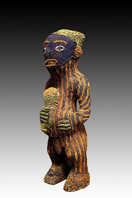 Bamun beaded figure of carved wood, native cloth and glass trade beads.  www.gallerytribalart.com