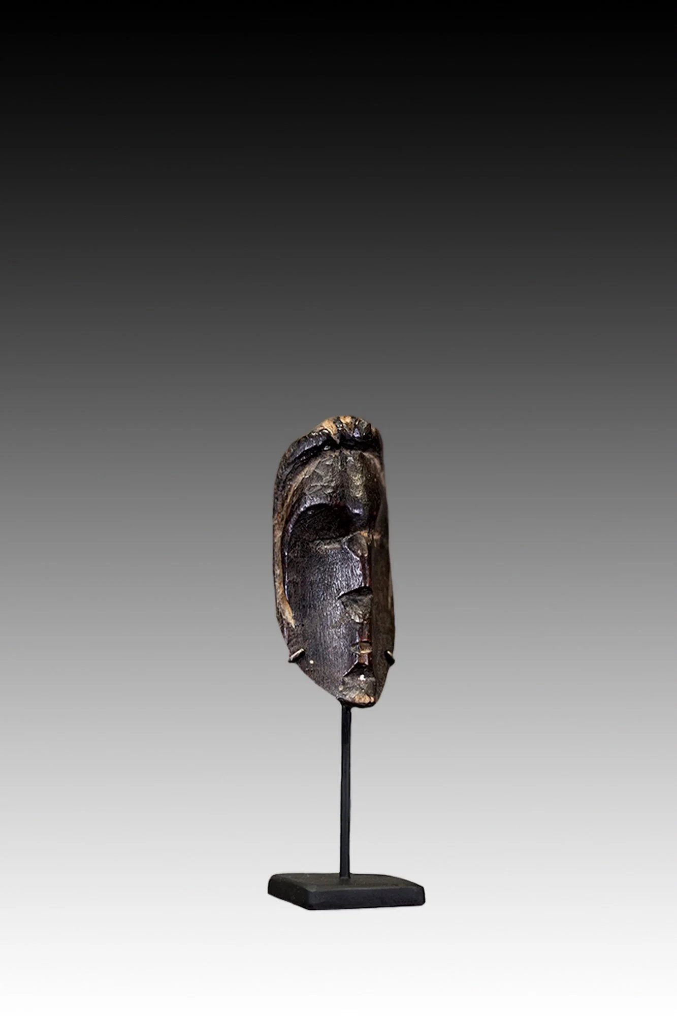 Dan miniature masks, carried by initiates for protection.  www.gallerytribalart.com