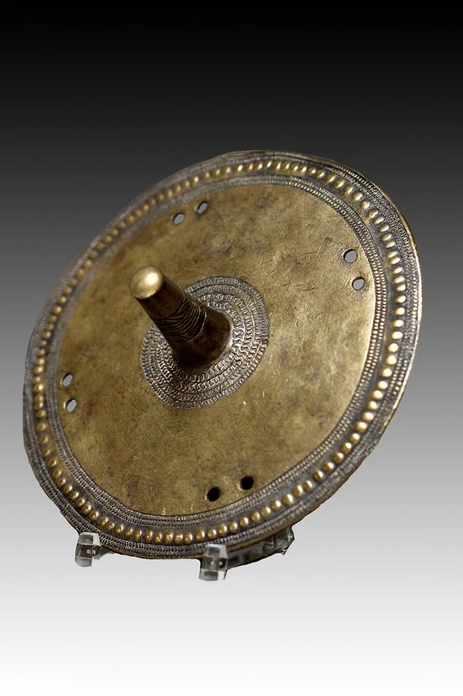 Borana brass ornament with raised dots and incised symbols.  www.gallerytribalart.com